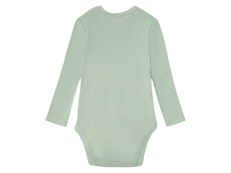 Un body bébé à manches longues de couleur vert clair.