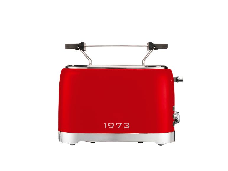 Grille-pain rouge avec l'inscription '1973' sur fond blanc.