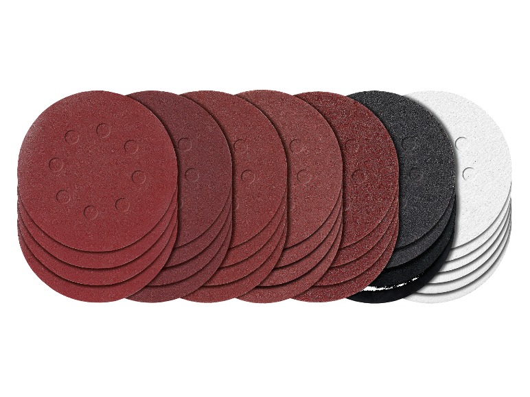 Assortiment de disques abrasifs de différents grains et couleurs.