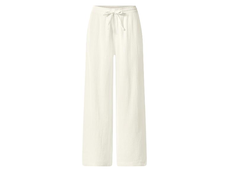Pantalon large en mousseline blanc avec cordon de serrage à la taille.