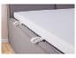 Matelas gris avec des poignées blanches