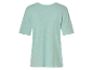 T-shirt en lin vert clair à manches courtes pour femme.
