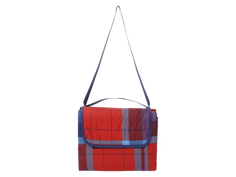 Couverture de pique-nique à carreaux rouges avec rayures bleues et bandoulière.