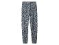 Pantalon bleu à motif floral blanc et taille élastique.