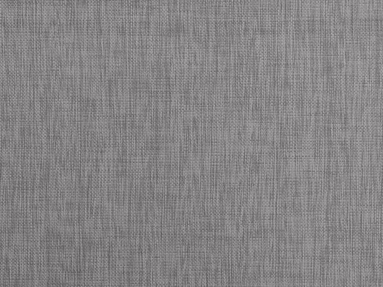 Tissu gris avec une texture tissée distincte.