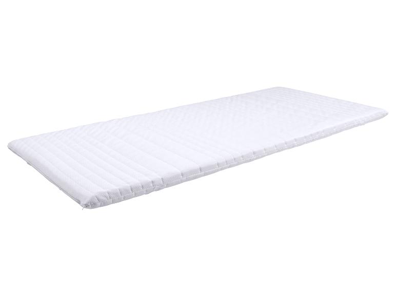 Protège-matelas blanc avec motif matelassé