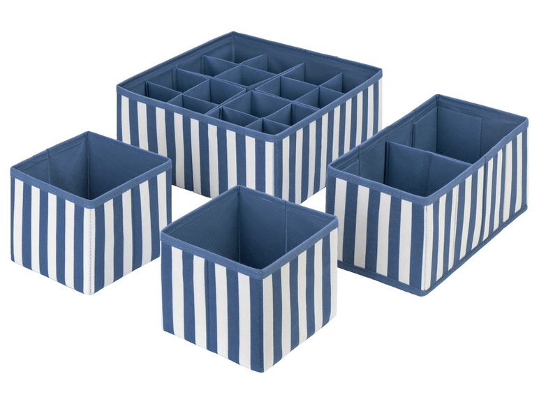Un ensemble de quatre boîtes de rangement bleues à rayures blanches.