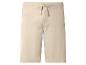 Shorts beiges avec cordon de serrage à la taille.