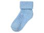 Une chaussette bleue à côtes.