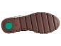 La semelle d'une chaussure marron avec un logo 'Ecco' vert.
