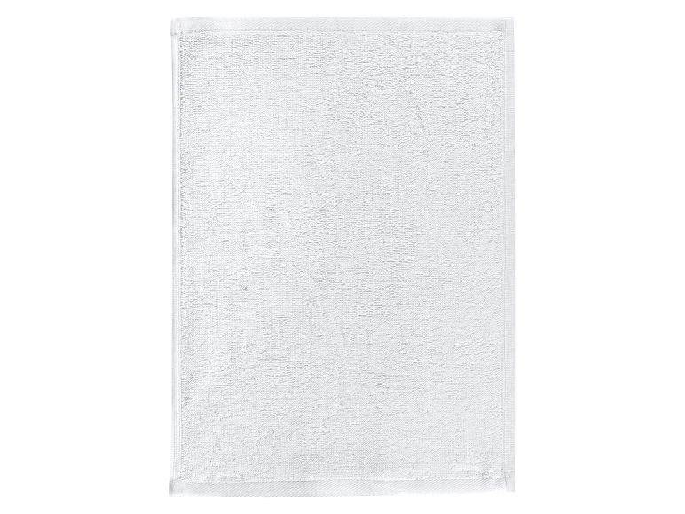 Tapis de bain blanc en éponge.