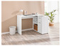 Un bureau d'angle blanc avec des tiroirs, des étagères et un ordinateur portable