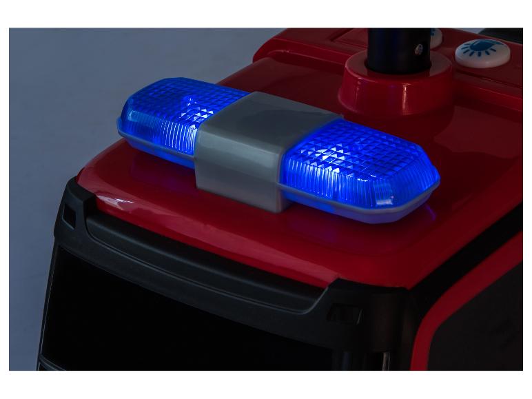 Gyrophares bleus sur un camion de pompiers jouet.