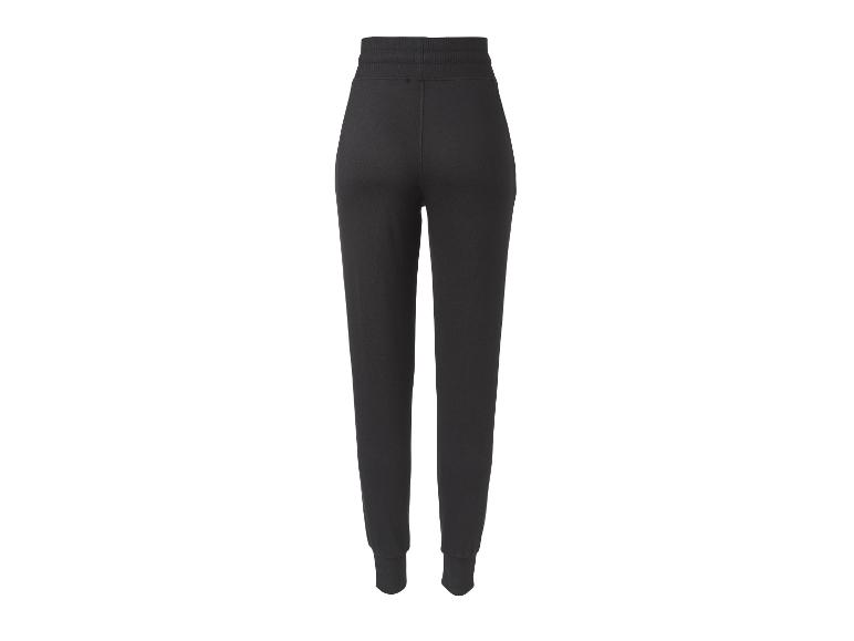 Pantalon de survêtement noir pour femme, vue arrière.