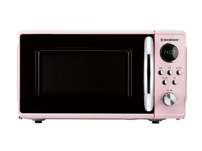 Four à micro-ondes SilverCrest rose.