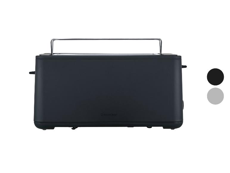 Grille-pain noir avec support à petits pains chromé et deux échantillons de couleur.