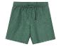 Shorts en lin vert foncé, style décontracté.