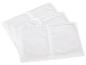 Quatre coussins chauffants blancs ou chauffe-mains, disposés en pile superposée.