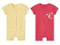 Deux pyjamas bébé zippés : un rayé jaune et un rose avec un loutre.