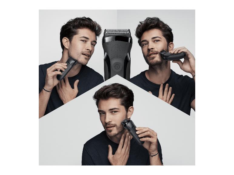 Un homme se rase avec un rasoir électrique.