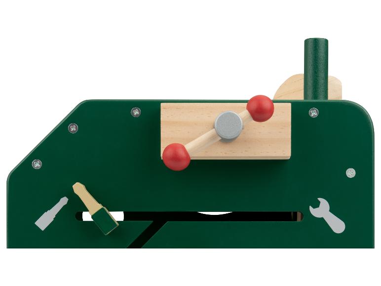 Jouet en bois vert avec levier rouge et outils.