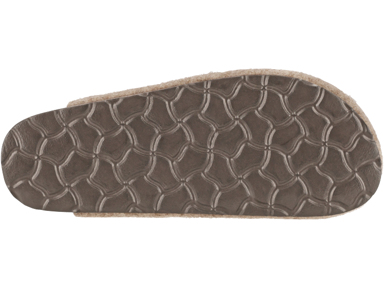 Semelle de chaussure marron avec motif en relief et bordure en fourrure