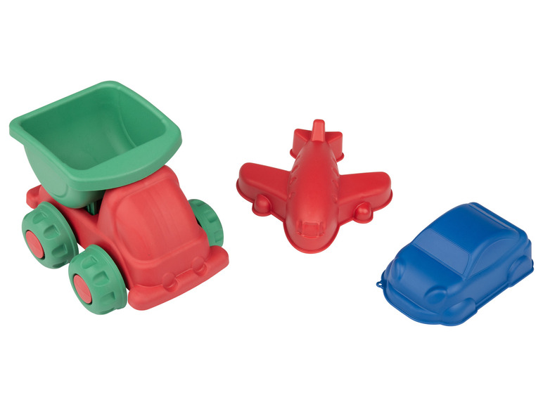 Un camion rouge avec une benne verte, un avion rouge et une voiture bleue.