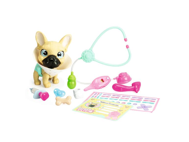 Jeu Pampers Pets avec bouledogue français et accessoires vétérinaires.