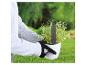 Plantation d'herbes aromatiques en pot avec étiquette.