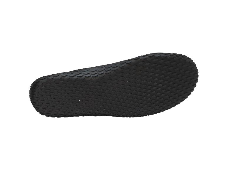 Semelle de chaussure noire avec texture antidérapante.
