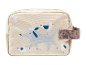 Nécessaire beige avec motif chien et mouettes.