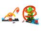 Deux ensembles de jeu Hot Wheels sur le thème des dinosaures et des serpents, avec pistes et voitures.