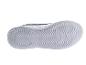 Semelle blanche de chaussure de sport avec un motif ondulé.