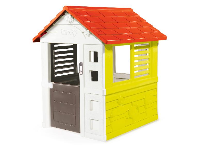 Une maison de jeu Smoby avec un toit rouge