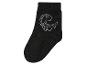 Chaussette noire avec un motif de dinosaure.