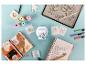 Mini-imprimante, stickers mignons, carnet et stylos colorés pour le journaling.