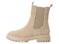 Bottines beige à semelle épaisse.