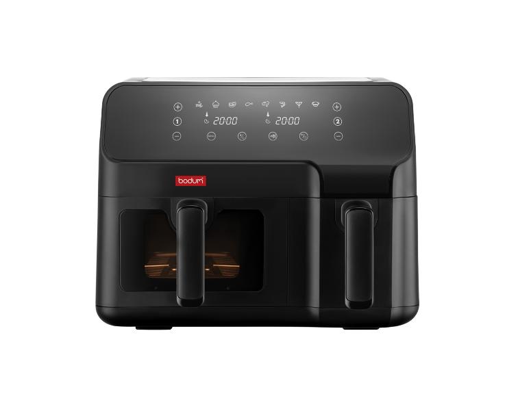 Friteuse à air noire Bodum avec deux paniers et un écran numérique.