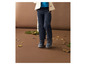 Pantalon de randonnée bleu marine et chaussures de randonnée pour enfants.
