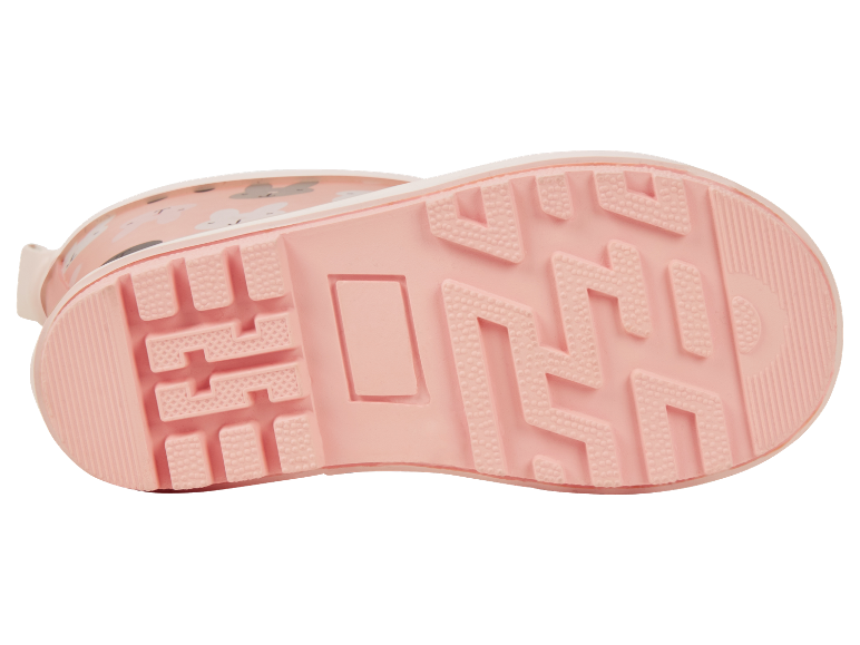Semelle rose d'une botte de pluie pour enfant avec un motif animalier.