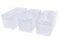 Trois bacs de rangement en plastique transparent de tailles variées.
