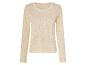 Pull beige clair en tricot ajouré.