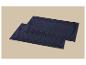 Deux tapis de bain rectangulaires bleu marine avec un motif en relief.