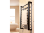 Sèche-serviettes électrique noir avec une serviette blanche dans une salle de bain moderne.
