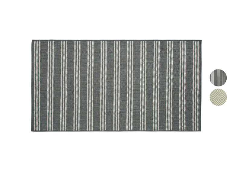 Un tapis à rayures grises avec un motif blanc.