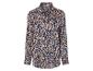Une chemise bleu marine avec un imprimé floral beige.