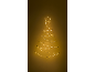 Décoration murale lumineuse en forme de sapin de Noël avec une étoile, brillant chaleureusement sur fond sombre.