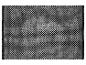 Tapis design géométrique noir et blanc.