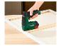 Agrafeuse sans fil PARKSIDE® 4V PAT 4 D6, utilisée pour fixer un cadre de toile.
