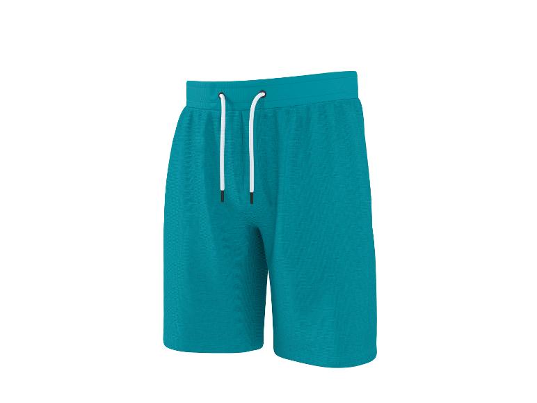 Shorts de sport bleu sarcelle avec cordon de serrage blanc.